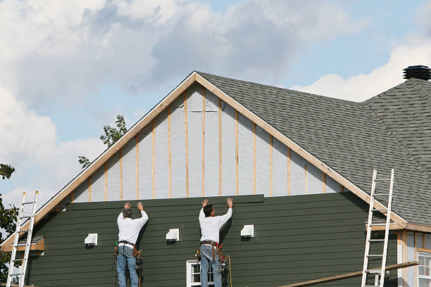 Professional Siding Replacement technician working in Melrose Park, NY